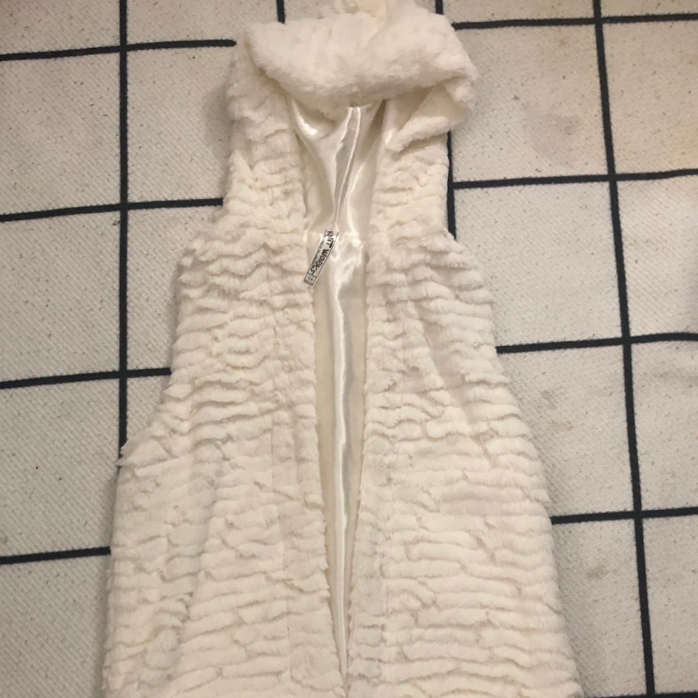 Fuzzy cream vest